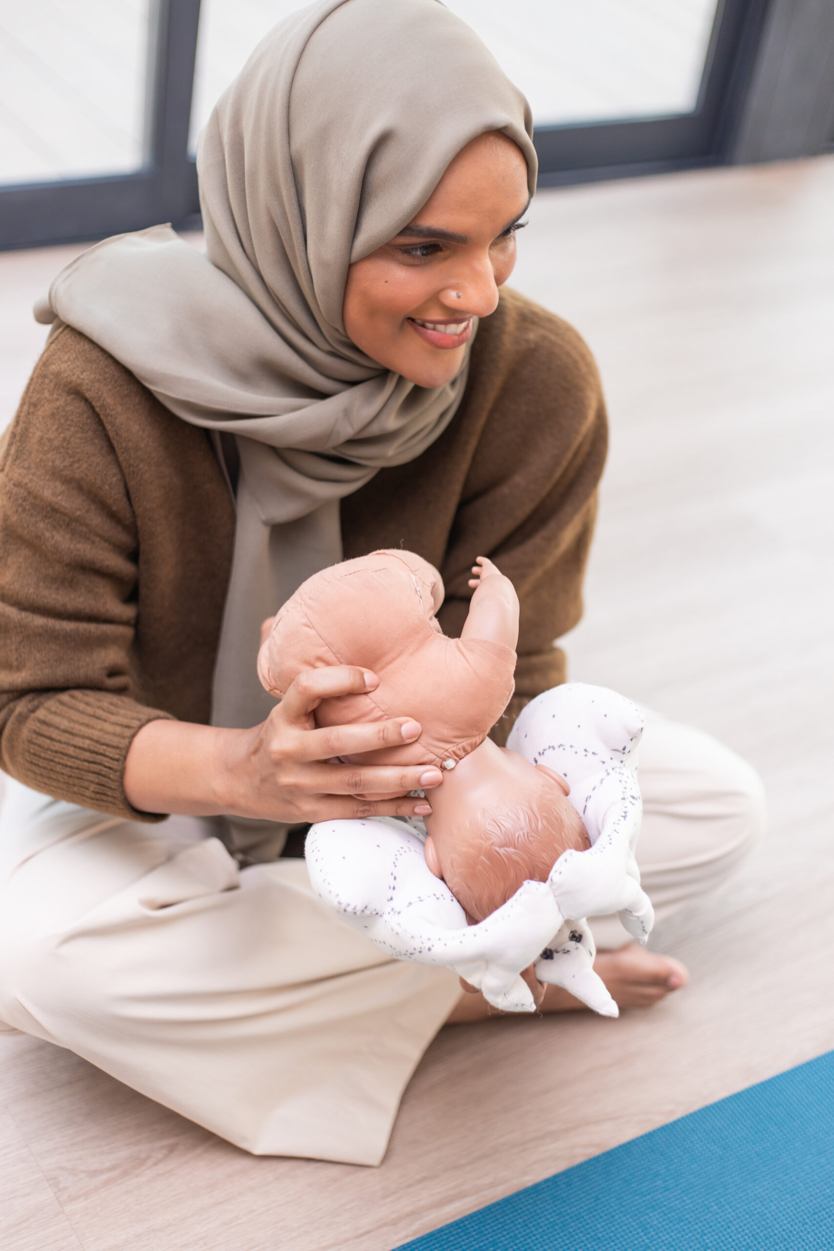 Iman holding baby